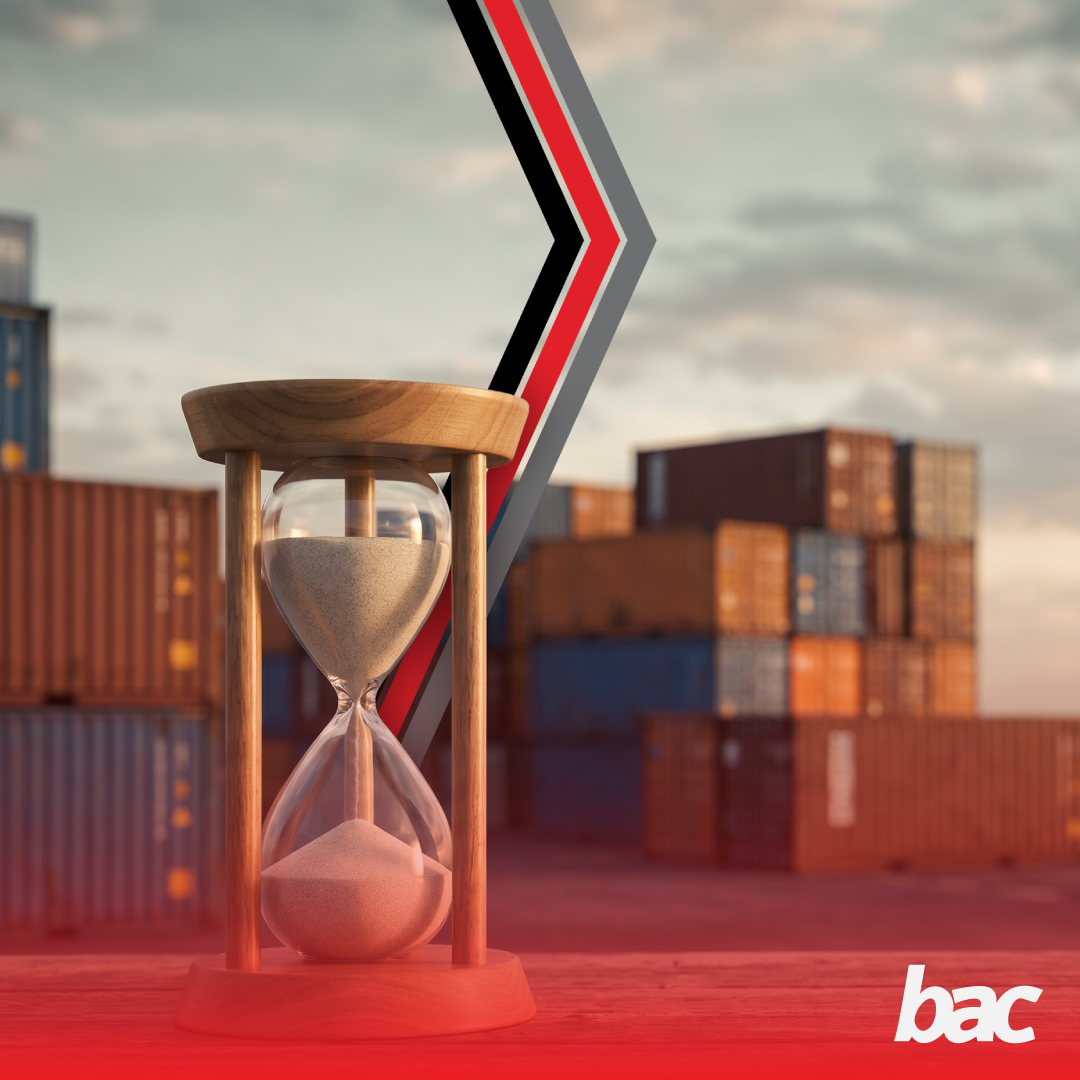 Hourglass in front of shipping containers representing customs delays and the importance of preventing cargo clearance issues.
