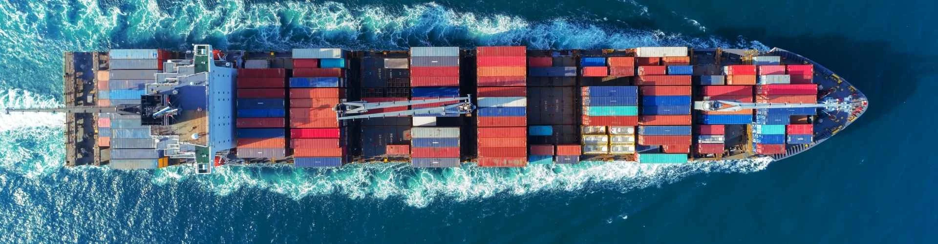 Cargo ship at sea transporting containers for international trade