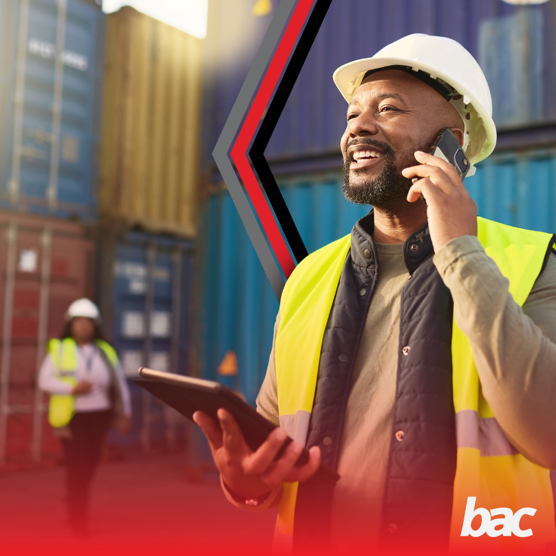 Logistics professional coordinating sea freight planning in a container yard